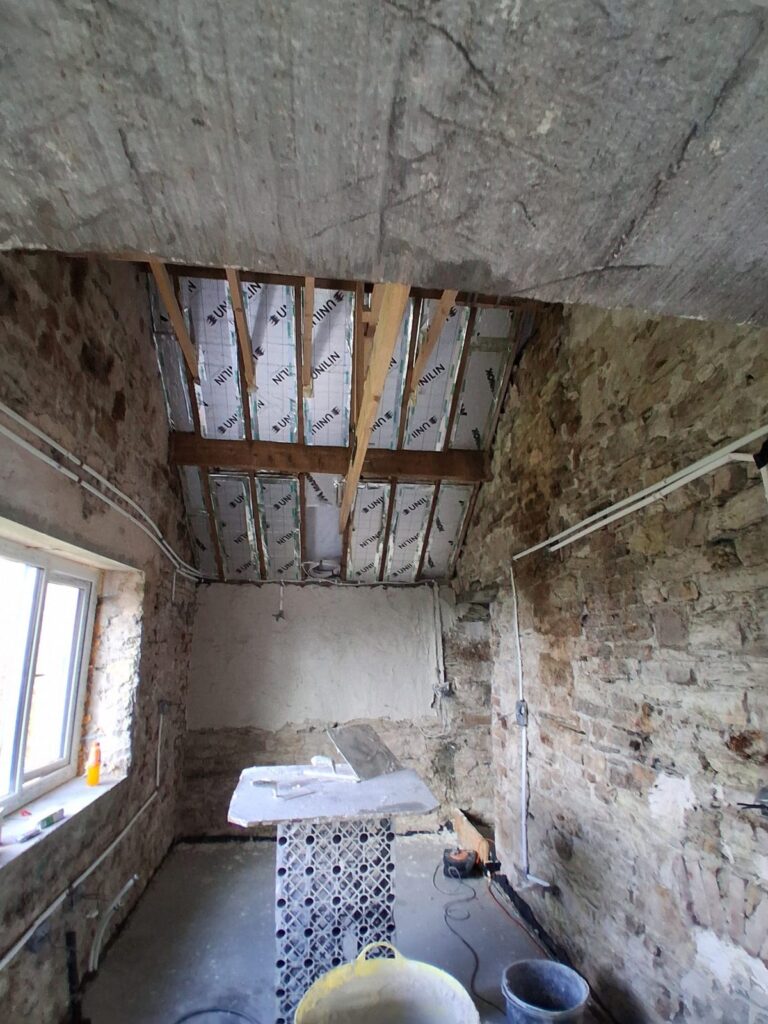 Stone cottage room stripped back before plastering