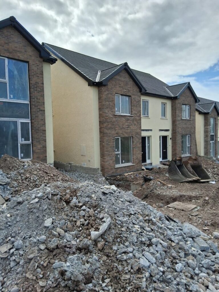 New-build housing with rendered and brick finishes